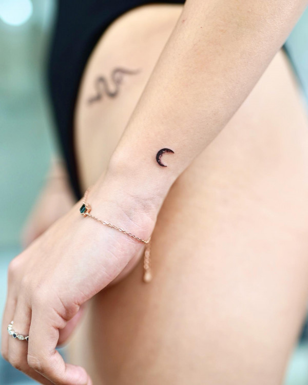 tiny moon on the wrist, wrist tattoo, tiny moon tattoo, crescent moon tattoo