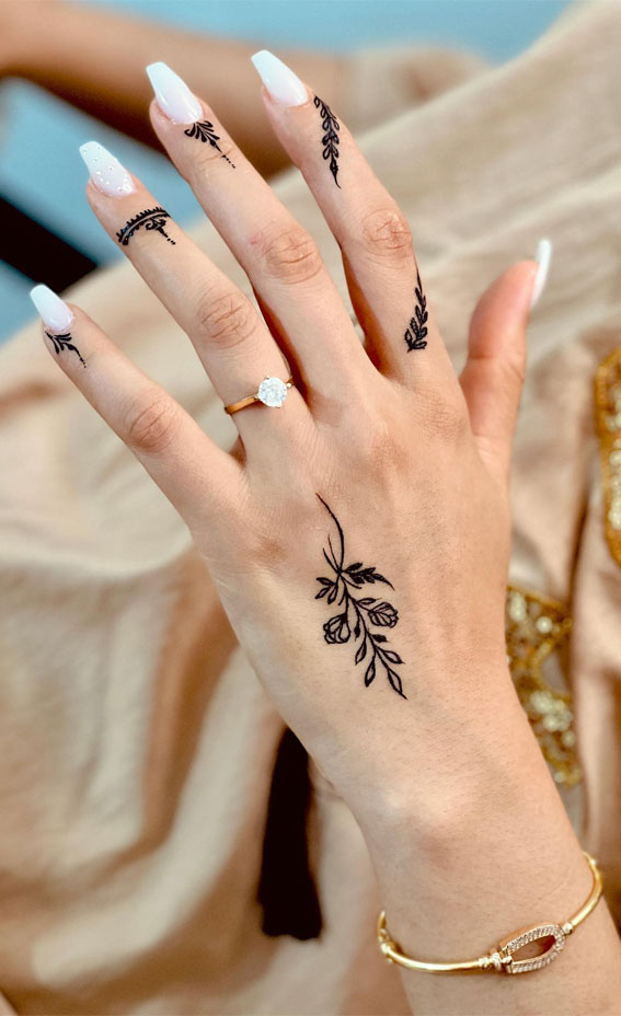 minimalist henna design on hand, leave henna, butterfly henna designs, henna designs, mehndi, simple henna designs, moon henna designs, floral henna designs, henna designs love heart, henna designs aesthetic, simple henna designs, henna designs for hand
