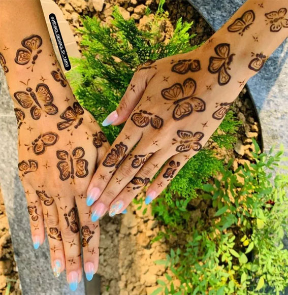 Whimsical Butterfly Henna Design with Sparkling Accents