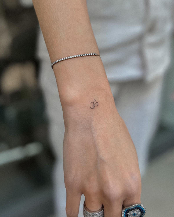 om tattoo on wrist, wrist tattoo, om symbol tattoo, meaningful small tattoos, Meaningful tattoos with meaning, small tattoos with meaning, Meaningful tattoos for ladies, meaningful tattoos symbols