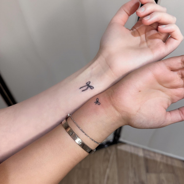 matching bow for best friends, matching tattoos, wrist tattoo ideas
