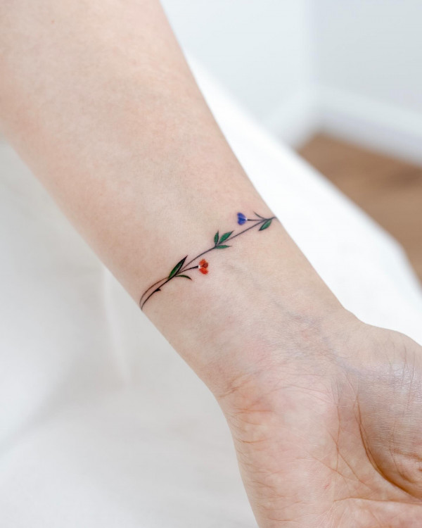 flower bracelet tattoo, wrist tattoos, cute tattoo, small wrist tattoo