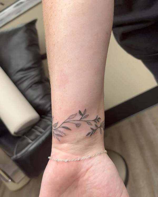 wrapping vine bracelet tattoo, wrist tattoos