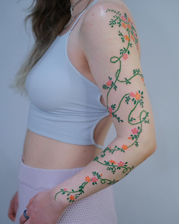 colourful floral vine tattoos, flower tattoo arm women. Flower tattoo arm female, floral arm tattoo, unique flower arm tattoos for females, colourful floral tattoos, Flower tattoo arm forearm