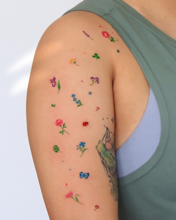 Flower freckles arm tattoos, colour flower arm tattoo