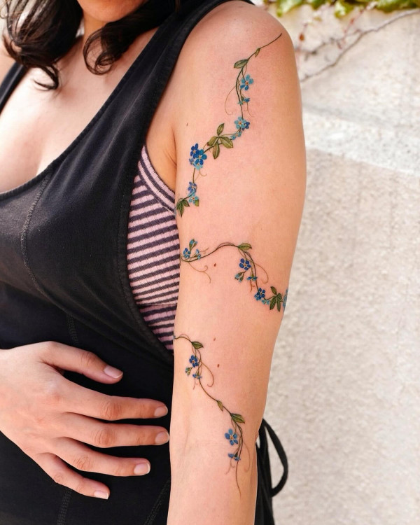 blue floral vine sleeve tattoos, flower tattoo arm women. Flower tattoo arm female, floral arm tattoo, unique flower arm tattoos for females, colourful floral tattoos, Flower tattoo arm forearm