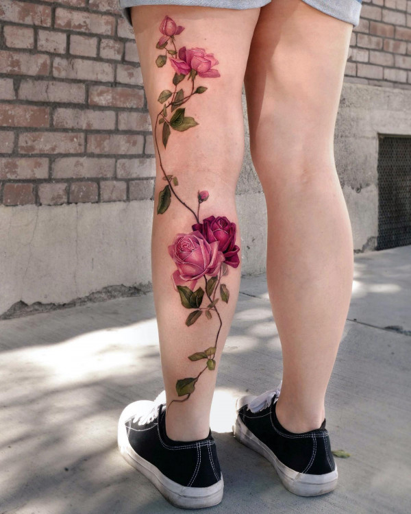 rose vine leg tattoos, wild flower leg tattoos, Floral leg tattoos for females, colourful flower leg tattoos