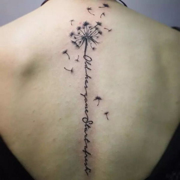 dandelion spine tattoo, birth flower spine tattoos, birth flower tattoo, birth flower spine tattoo, flower spine tattoos