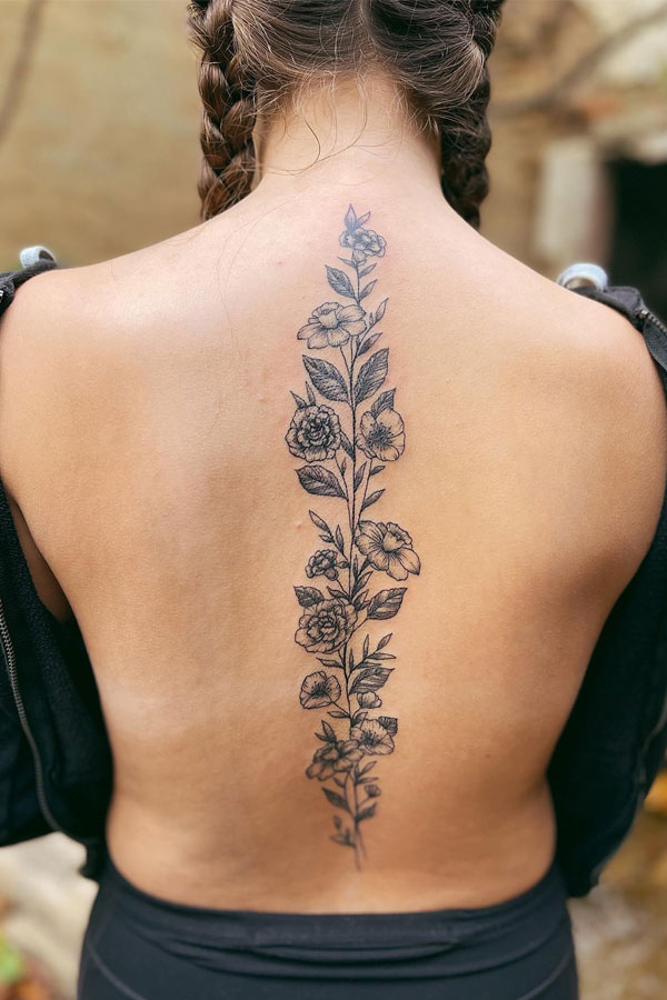 Carnation and Daffodil Spine Tattoo,  Elegant Flower Spine Tattoo, flower spine tattoos, floral vine spine tattoo