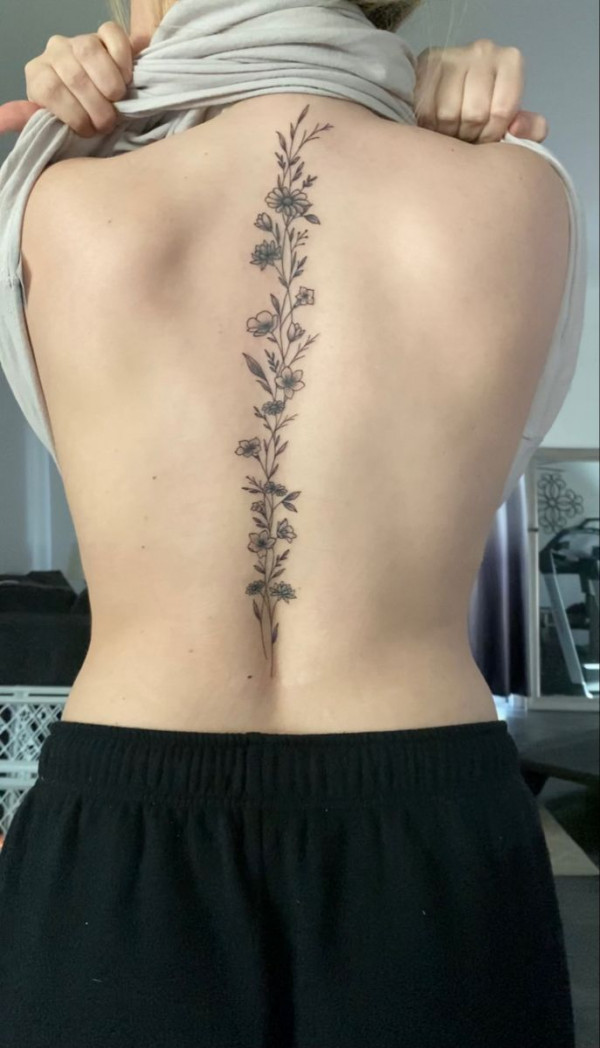 Gorgeous Floral Spine Tattoo Female