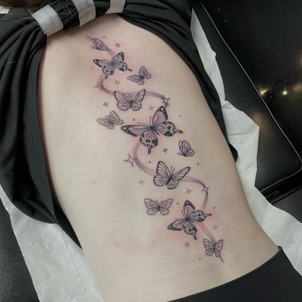 Enchanting Sparkling Butterflies Spine Tattoo