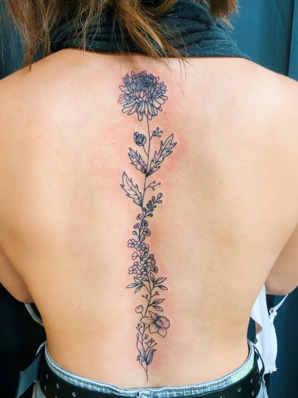 Floral spine tattoo small, flower spine tattoo, Floral spine tattoo female, birth flower spine tattoo, Floral spine tattoo meaning, simple flower spine tattoo, Floral spine tattoo ideas, delicate flower spine tattoo