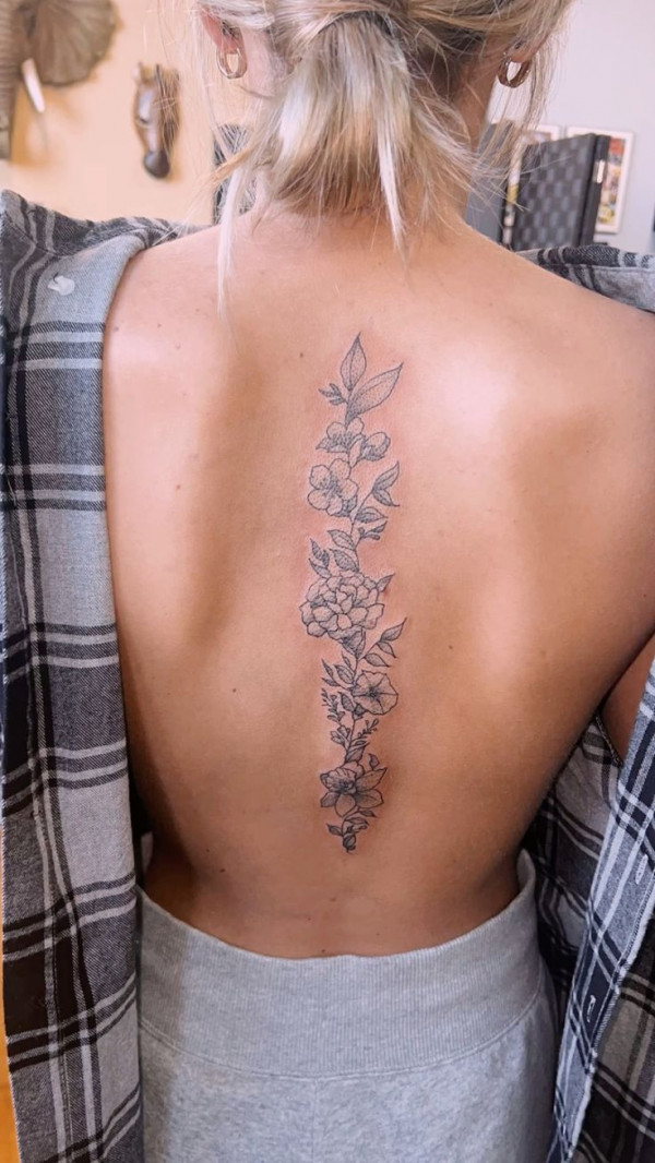 Embracing Bloom Flower Vine Spine Tattoo