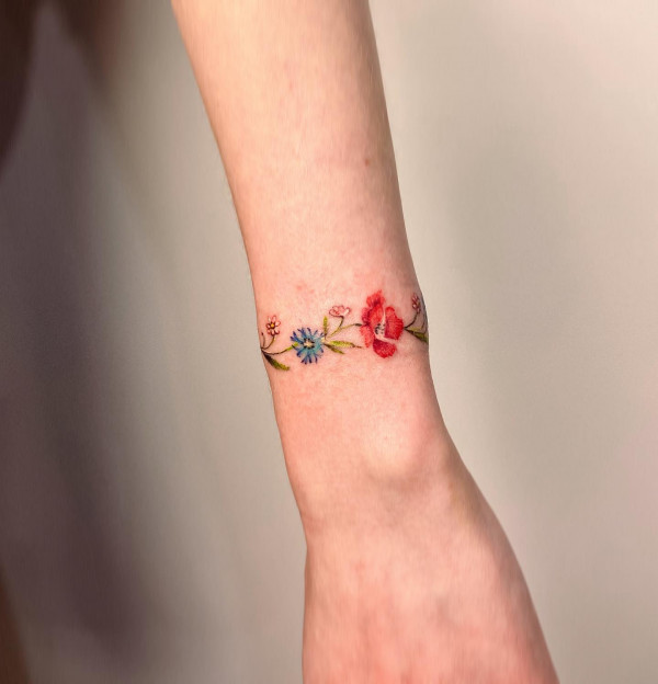 Daisy & Poppy Flower Bracelet Tattoo Wrist, floral bracelet tattoo, flower bracelet tattoo designs, wrist tattoo