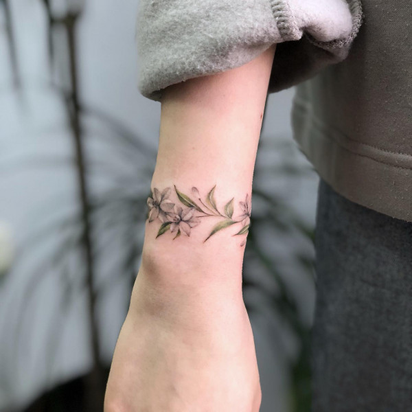 lily bracelet tattoo, lily wrist bracelet tattoo, flower bracelet tattoo