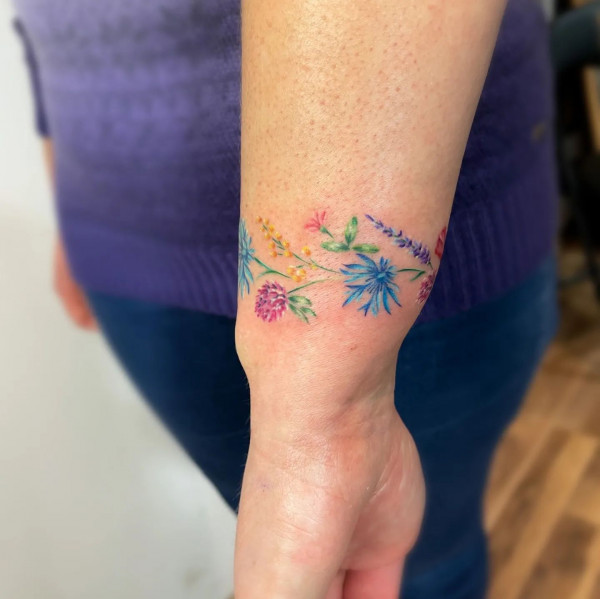 Colourful Wild Flower-inspired Bracelet Wrist Tattoo, floral wrist bracelet tattoo, Floral Bracelet Tattoo Wrist, floral bracelet tattoo, flower bracelet tattoo designs, wrist tattoo, floral bracelet tattoo designs