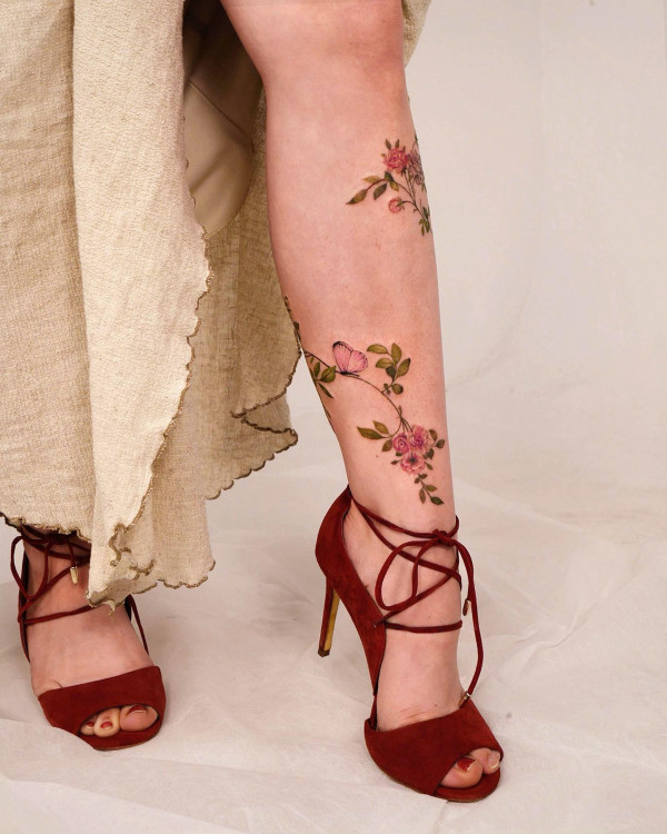 rose vine leg tattoos, wild flower leg tattoos, Floral leg tattoos for females, colourful flower leg tattoos