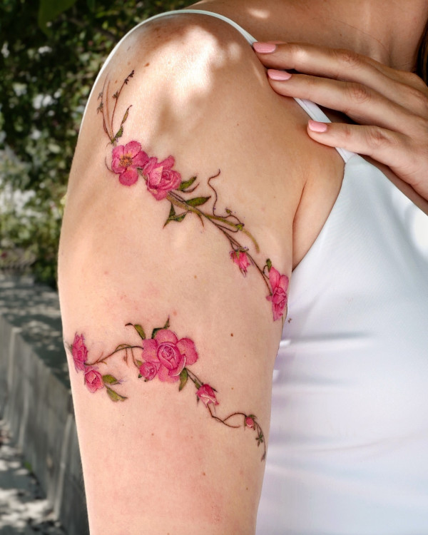 Pink Rose Vine Tattoo, colorful flower arm tattoo