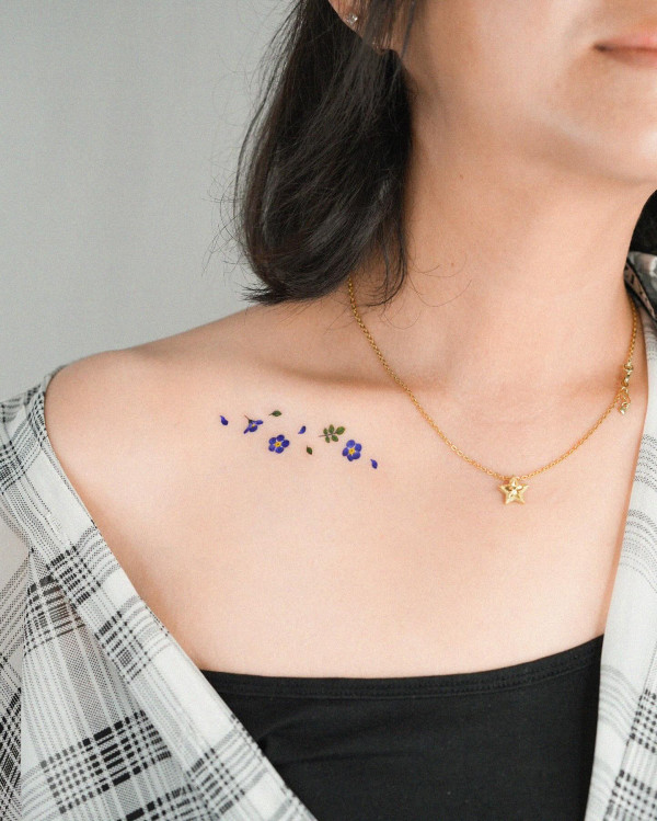 50 Best Floral Tattoos : Forget Me Not Tattoo Collarbone