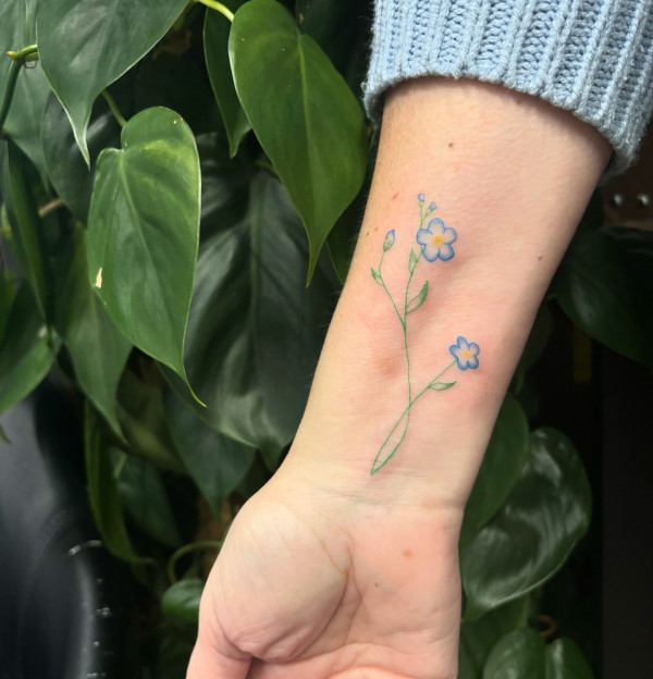 Forget-Me-Not Wrist Tattoo, colorful flower tattoos for females, colourful floral tattoos, Colourful flower tattoos small, Colourful flower tattoos for females, colored flower tattoo sleeve, colorful flower tattoos, colour floral tattoo