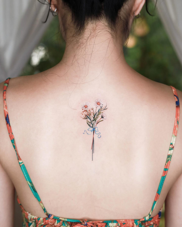 Bouquet of Daisies Spine Tattoo, flower spine tattoo, colourful flower tattoos