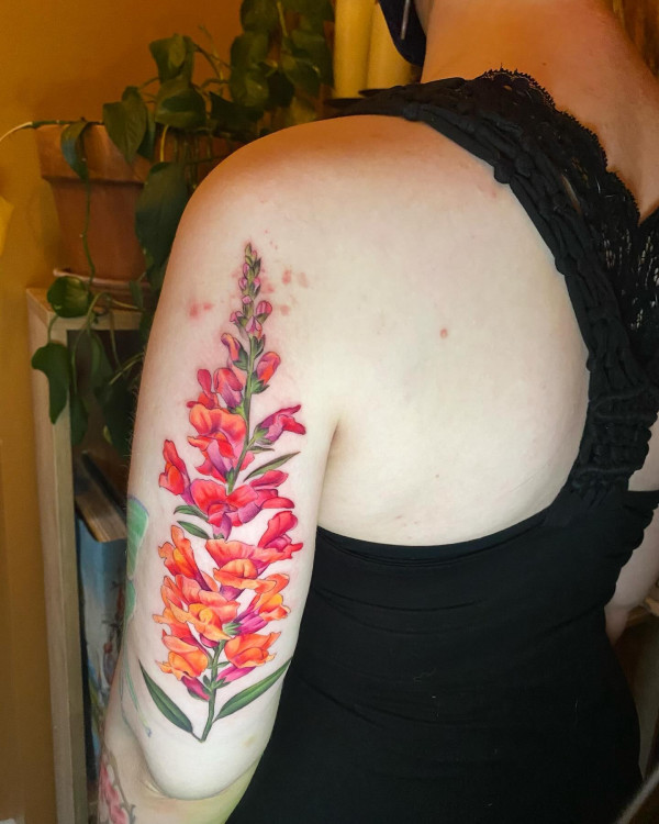 Colourful Snapdragon Tattoo, flower tattoo on arm, colorful flower tattoos