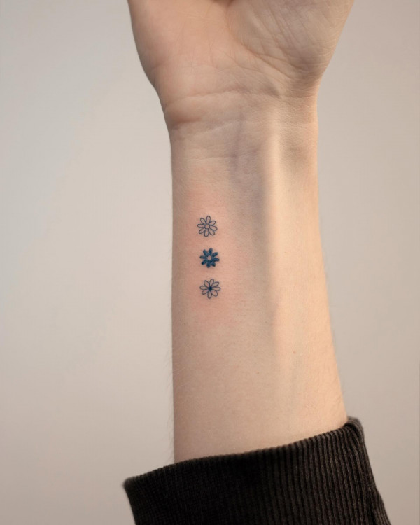 50 Best Floral Tattoos : Simple Flower Wrist Tattoo