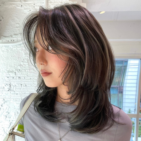 Butterfly Layered Medium-Length Haircut with curtain bangs