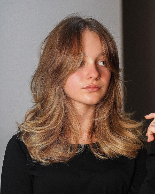 Brown with Blonde Mid-Length Layers with Curtain Bangs