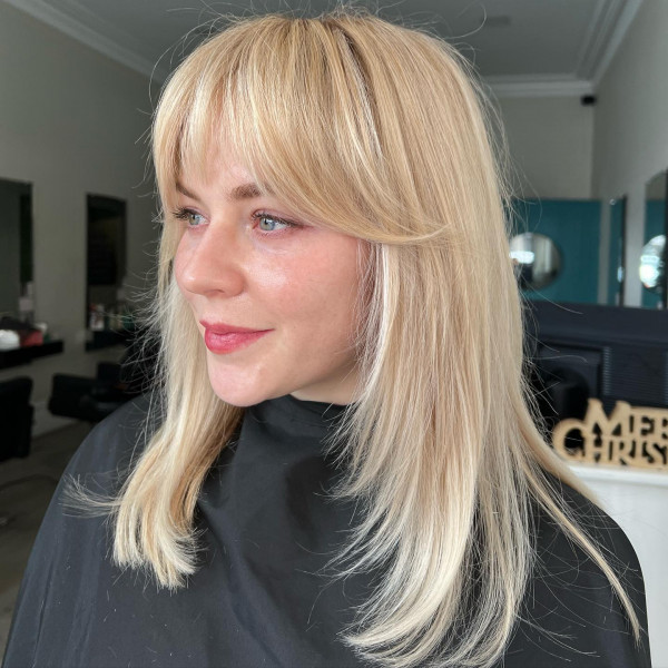 Baby Blonde Long Layers with Shaggy Curtain Bangs