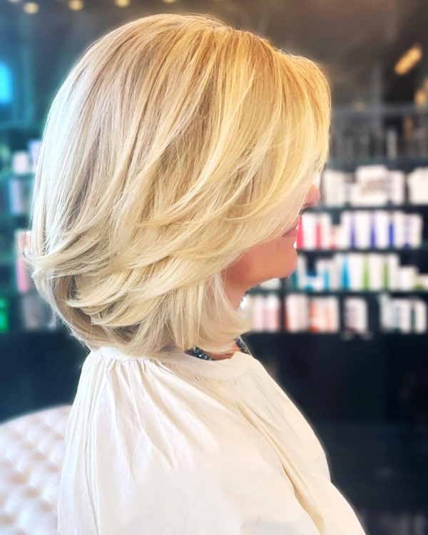 Medium-Length Layered Bob with Side Bangs