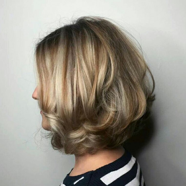 dimensional Bouncy Medium-Length Layered Bob