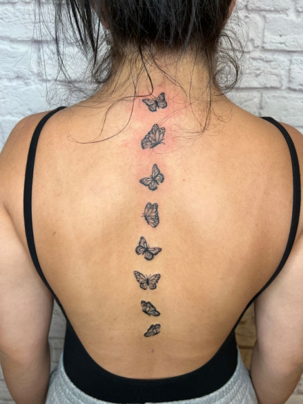 butterfly tattoos, spine butterfly tattoos, spine tattoos