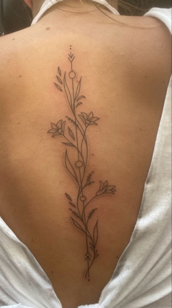 Graceful Lily Floral Vine Spine Tattoo