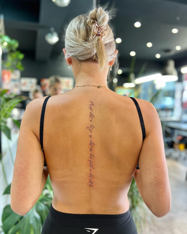 fine line tattoo, script spine tattoo, spine tattoo with script
