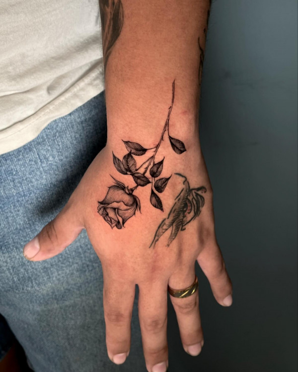 25 Timeless Rose Hand Tattoos : Minimalist Fine Line Rose Hand Tattoo