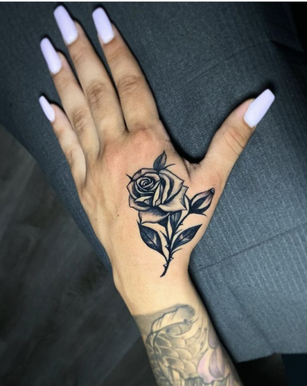 Bold Contrast Black Rose Hand Tattoo, hand tattoos rose