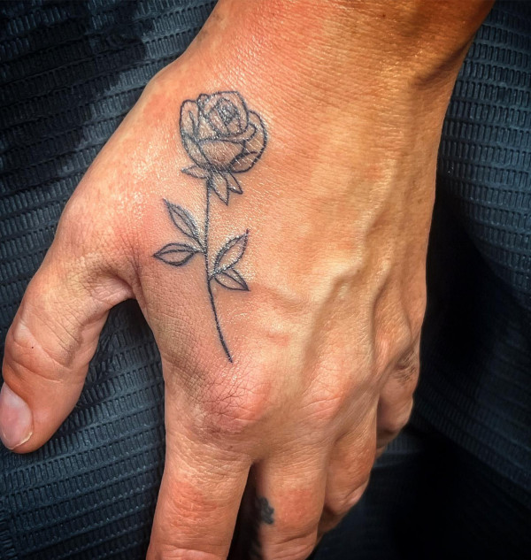 25 Timeless Rose Hand Tattoos : Fine Line Rose Hand Tattoo