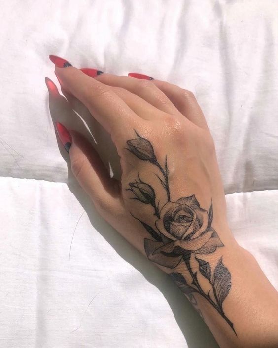 25 Timeless Rose Hand Tattoos : Ethereal Black and Grey Rose Hand Tattoo