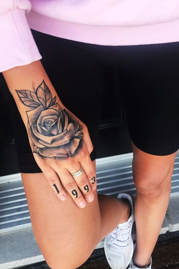 25 Timeless Rose Hand Tattoos : Black and Grey Rose Hand Tattoo with Script