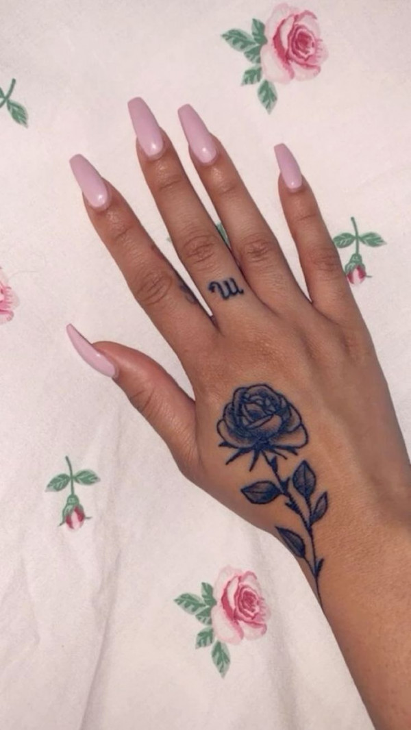 25 Timeless Rose Hand Tattoos : Minimalist Rose Hand Tattoo