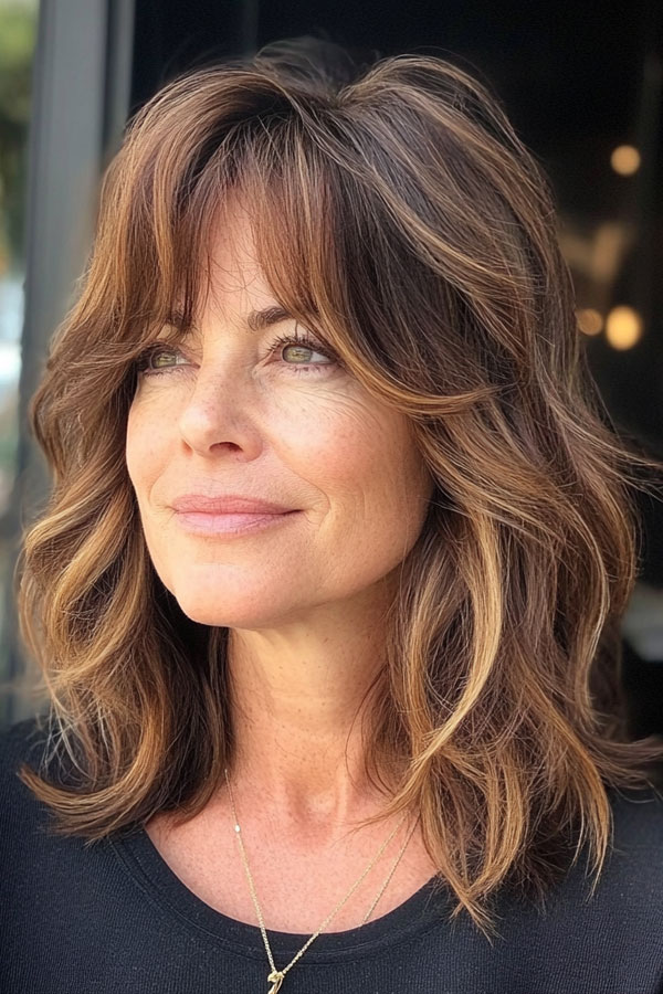 Textured Brunette Layered Waves with Highlights, Collarbone-Length Haircut for over 60, collarbone Hairstyle For Women Over 60