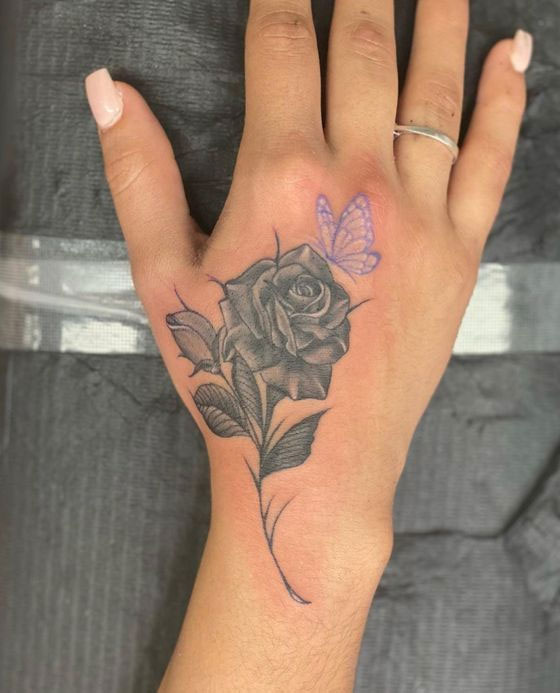 25 Timeless Rose Hand Tattoos : Rose and Butterfly Hand Tattoo