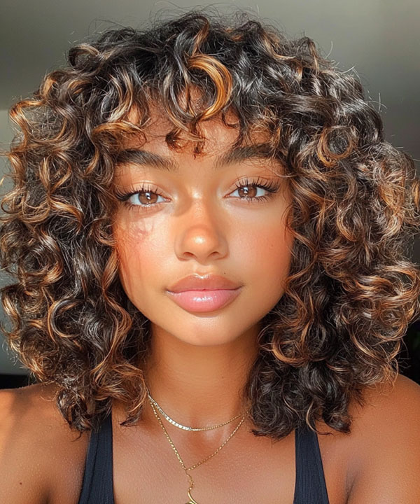 Curly Bob with Tousled Bangs, curly shoulder length haircut with fringe