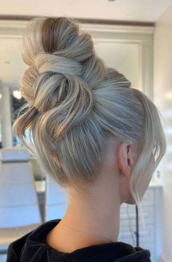 Effortlessly Twisted Updo, 90s inspired updo, Pamera Anderson inspired updo, piled updos, trending piled updo hairstyle, trendsetting updo hairstyle