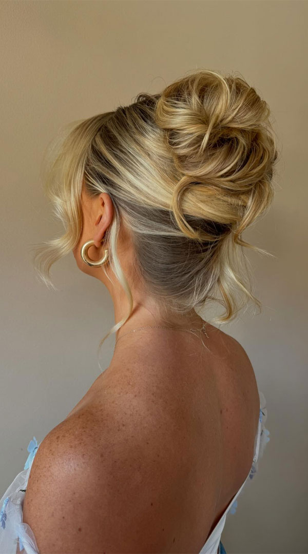 Elegant Blonde Piled Updo with Soft Curls90s inspired updo, Pamera Anderson inspired updo, piled updos, trending piled updo hairstyle, trendsetting updo hairstyle