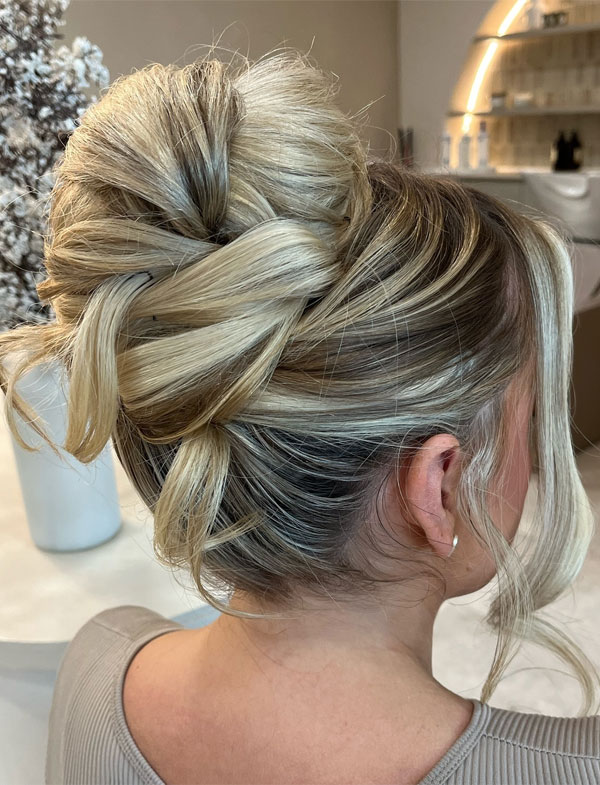 Elegant Twisted Blonde Updo, 90s inspired updo, Pamera Anderson inspired updo, piled updos, trending piled updo hairstyle, trendsetting updo hairstyle