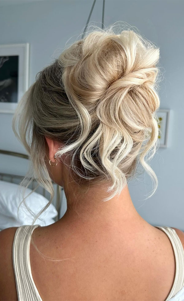 Messy Blonde Twisted Updo, 90s inspired updo, Pamera Anderson inspired updo, piled updos, trending piled updo hairstyle, trendsetting updo hairstyle