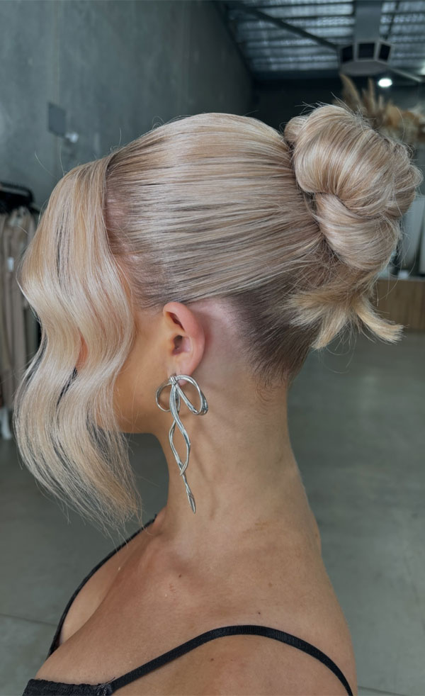 Sleek Blonde Updo with Soft Waves, 90s inspired updo, Pamera Anderson inspired updo, piled updos, trending piled updo hairstyle, trendsetting updo hairstyle