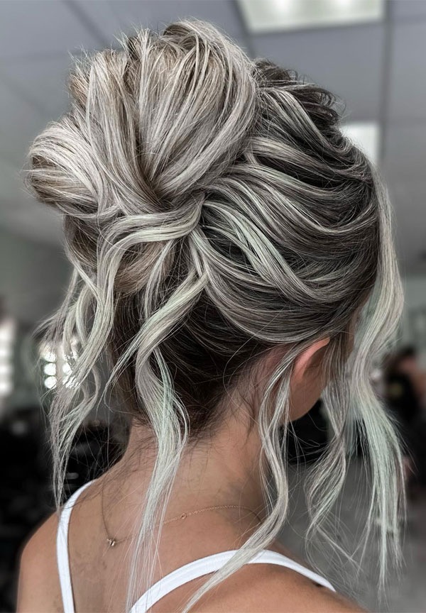 Textured Ash Blonde Updo with Loose Waves, 90s inspired updo, Pamera Anderson inspired updo, piled updos, trending piled updo hairstyle, trendsetting updo hairstyle